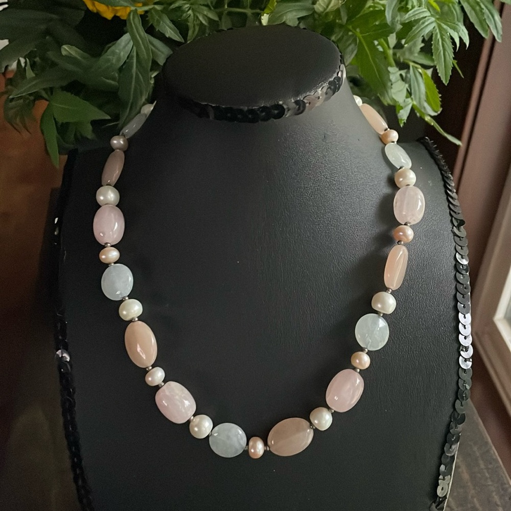 Heavy polished stone necklace.